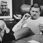 Photograph of George Steinbrenner at his desk before Game 2 of the 1981 World Seriesâand that's an autographed picture of Cary Grant